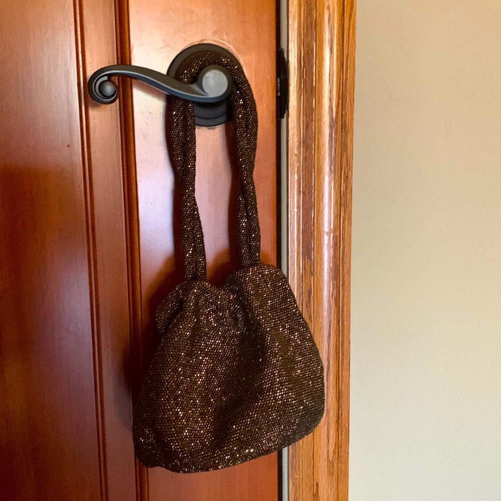 Clutch purse , beaded like new copper shiny